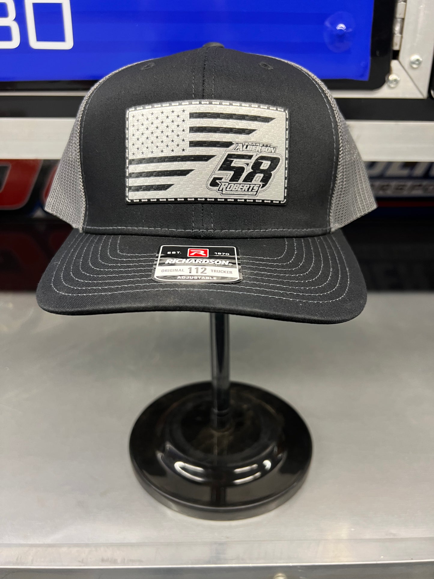 Black/Grey Richardson 112 with Silver/Black with American Flag/Alberson/58/Roberts Patch